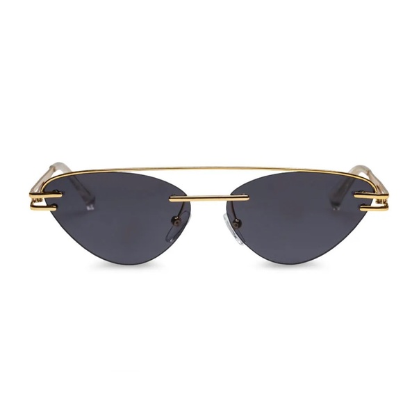 The Bright Gold Coupe Sunglasses
Le Specs x Adam Selman - Picture 1 of 6